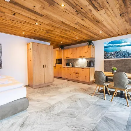 Апартаменти Alpine Essence Luxury In