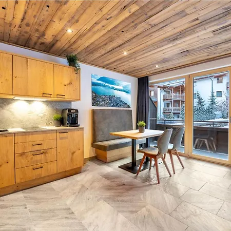 Апартаменти Alpine Essence Luxury In *